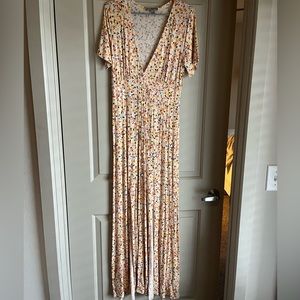 Long floral dress with slits on either side. Never worn